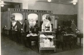 Black and white image of the Singer Sewer Company exhibit at the National Electrical and Radio Exposition.