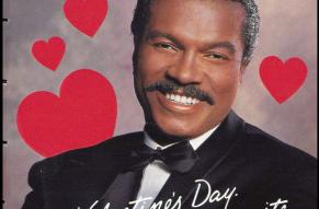 Valentine's Day themed cover of an Avon catalog featuring Billy Dee Williams.