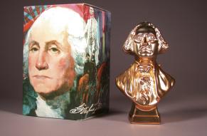 Color photograph of a box and bottle of George Washington themed cologne.