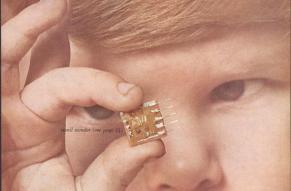 Cover of DuPont Magazine showing a close-up of a child examining a computer chip.