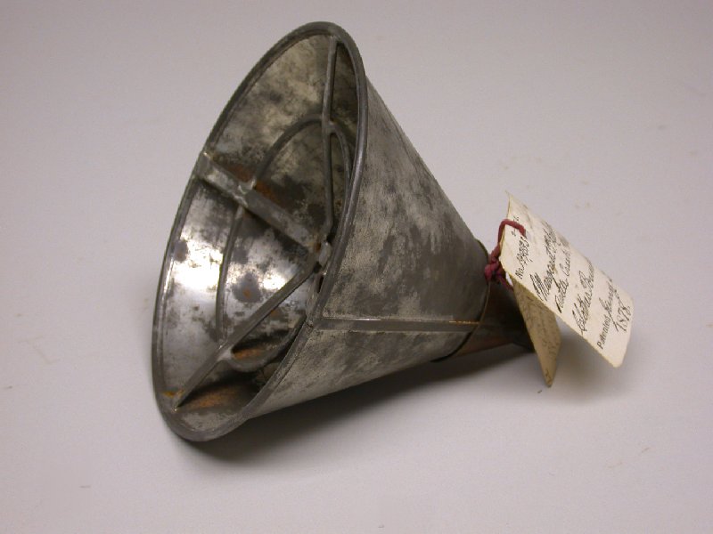 Clothes pounder patent model which resembles a metal funnel